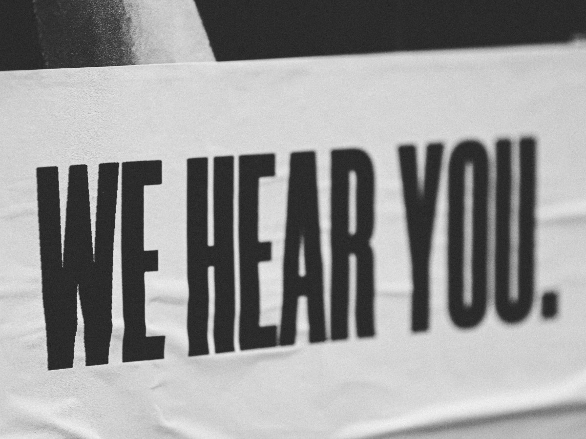 We Hear You. printed on a piece of paper